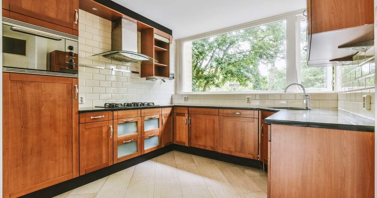 large brown stained cabinet kitchen 